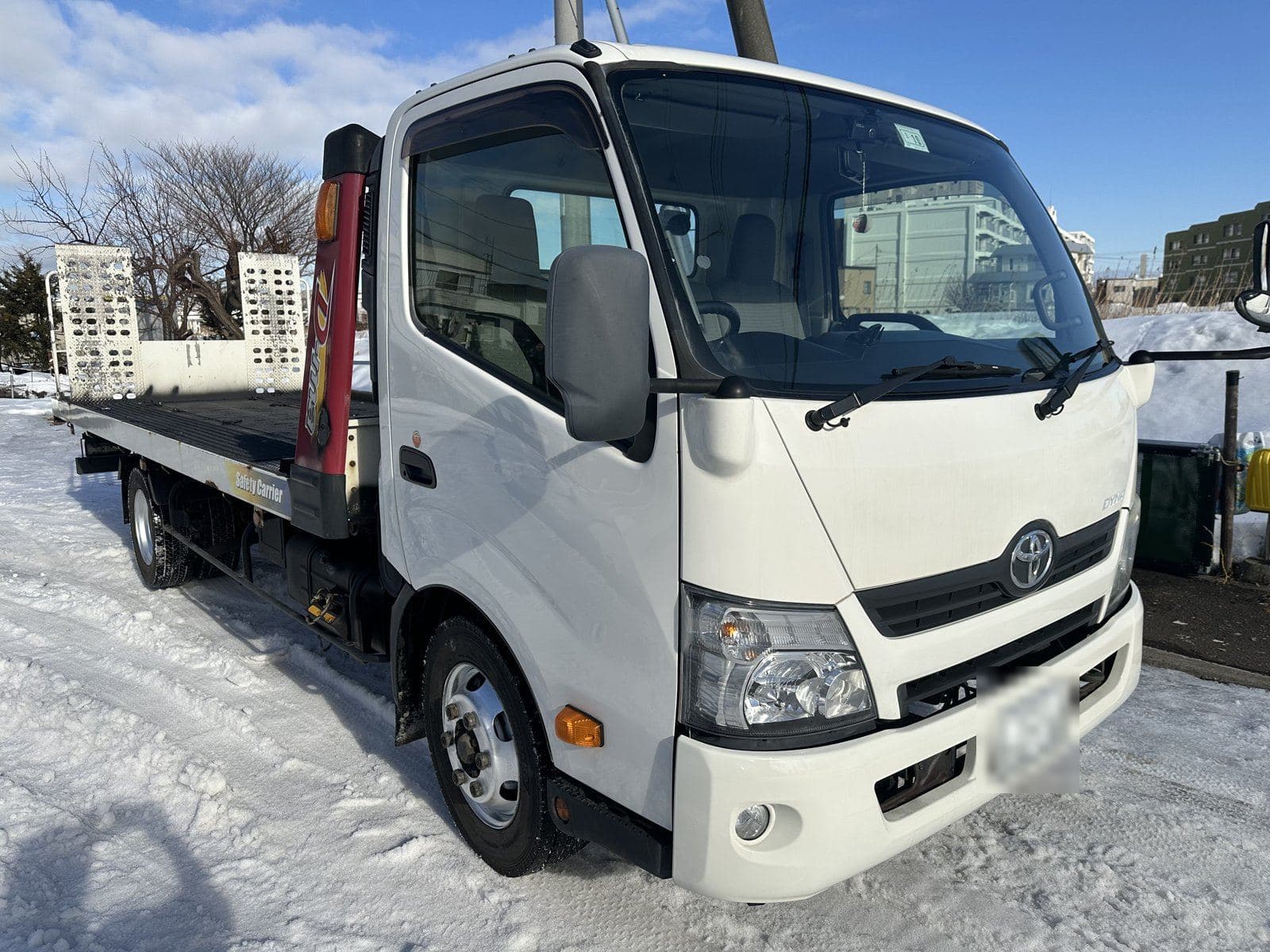 引き取りに伺う積載車